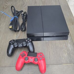 Sony PlayStation 4 Console with Black and Red Controllers
